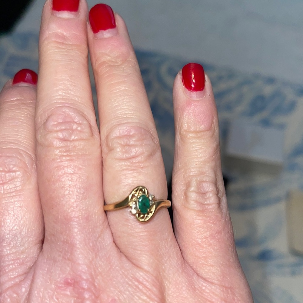Emerald ring with diamond accents